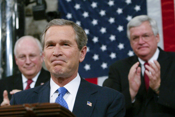 Then vice president Dick Cheney, back left, applauds as president George W. Bush pauses during his State of the Union address in 2003.